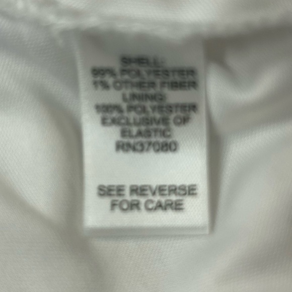 White Ruffle Sleeveless Blouse with Tie Neck. - Picture 7 of 8